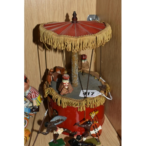 417 - A TINPLATE CLOCKWORK MUSICAL CAROUSEL, c.1930s, red painted base with transfers and canopy, wooden f... 