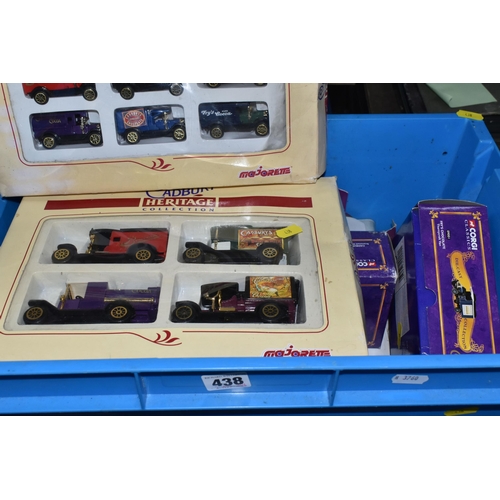 438 - A QUANTITY OF TWENTY ONE BOXED MODEL DIECAST VEHICLES, to include twelve Lledo Walkers Crisps vehicl... 