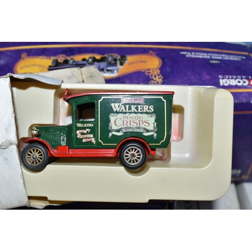 438 - A QUANTITY OF TWENTY ONE BOXED MODEL DIECAST VEHICLES, to include twelve Lledo Walkers Crisps vehicl... 