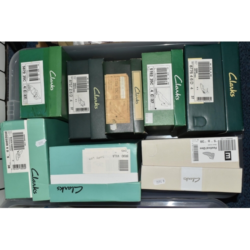 460 - FOUR BOXES OF LADIES SHOES, to include a pair of navy blue Boss trainers Euro size 42, together with... 