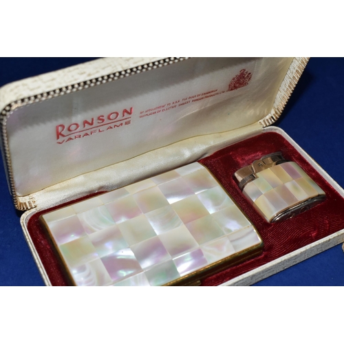 466 - A BOX OF VINTAGE BOXED LIGHTERS to include a Ronson Varaflame in original box, a Ronson enamelled Ba... 