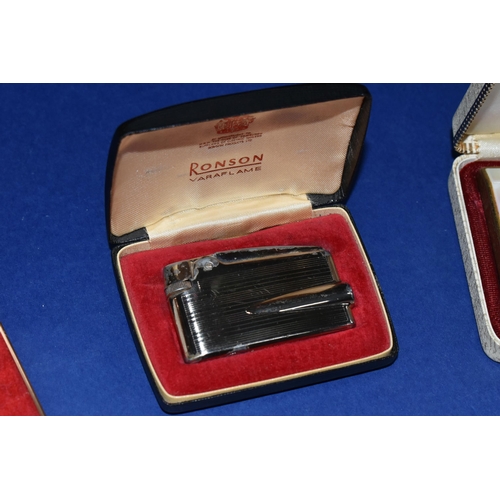 466 - A BOX OF VINTAGE BOXED LIGHTERS to include a Ronson Varaflame in original box, a Ronson enamelled Ba... 