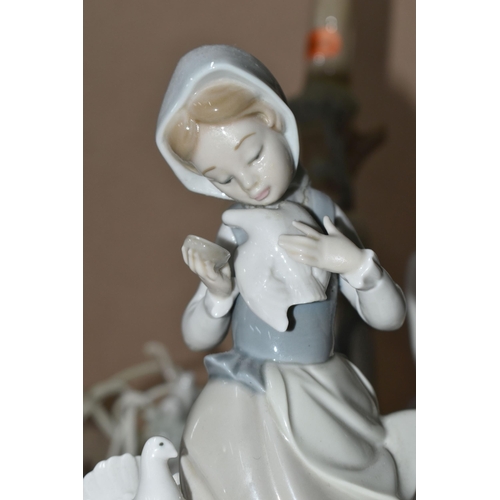 471 - A GROUP OF LLADRO DAISA FIGURES to include a Girl with Milk Pail No. 4682, a Girl with Lantern No. 4... 