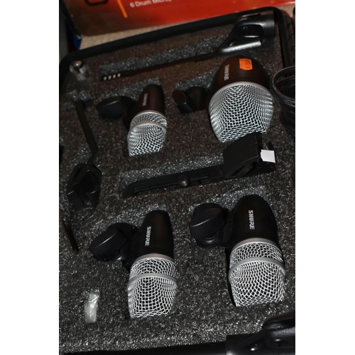 482 - A SHURE PG DRUM MIC KIT to include six microphones in original carry case and box , six XLR cables i... 