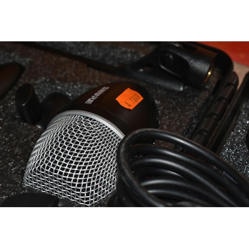 482 - A SHURE PG DRUM MIC KIT to include six microphones in original carry case and box , six XLR cables i... 