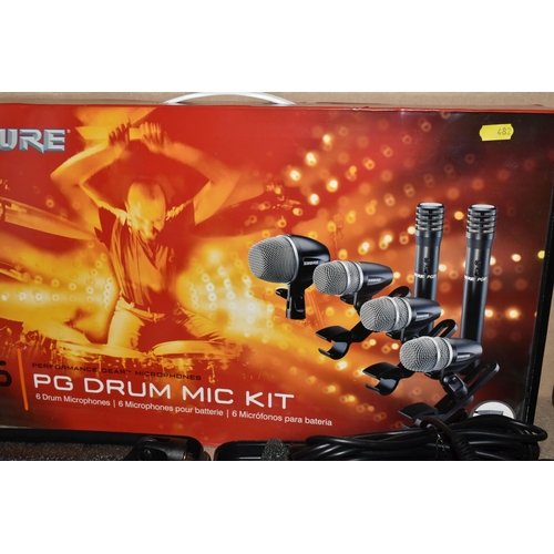 482 - A SHURE PG DRUM MIC KIT to include six microphones in original carry case and box , six XLR cables i... 