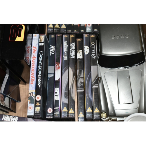 485 - A COLLECTION OF ASSORTED JAMES BOND FILM DVDS AND OTHER MODERN BOND MEMORABILIA, to include over 20 ... 