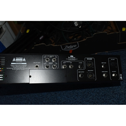 486 - A BOX AND LOOSE MUSIC ACCESSORIES, to include a Focus rite Platinum Voice Master Pro, a Pure Tone mu... 