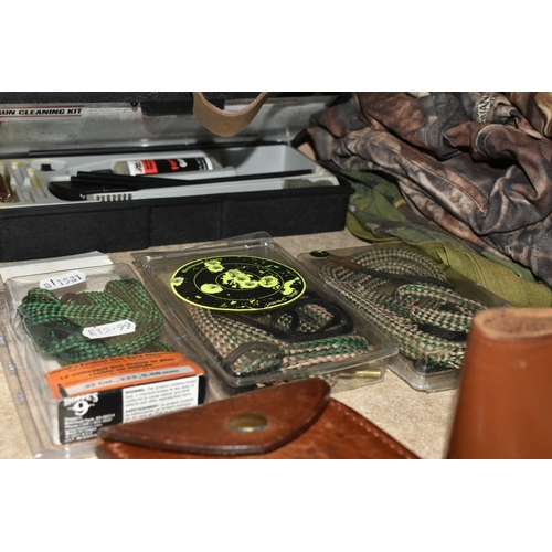 492 - A SELECTION OF ITEMS RELATED TO SHOOTING AND CAMOUFLAGE CLOTHING, to include Tetra Gun Pro Smith cle... 