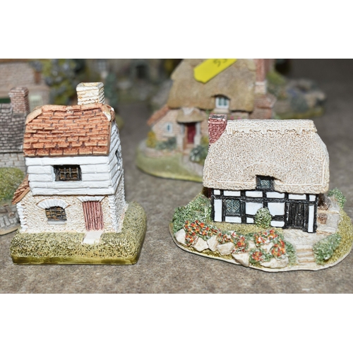 534 - A GROUP OF EIGHT LILLIPUT LANE COTTAGE SCULPTURES, comprising Miniature Masterpieces 'Three Feathers... 