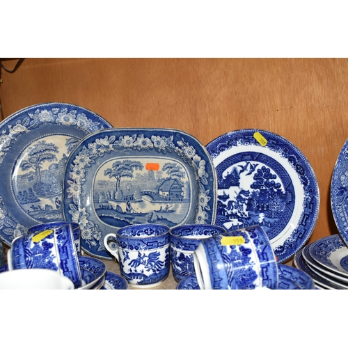 555 - A GROUP OF BLUE AND WHITE WILLOW PATTERN TABLEWARE AND SIMILAR, comprising a C.W.S Windsor China par... 