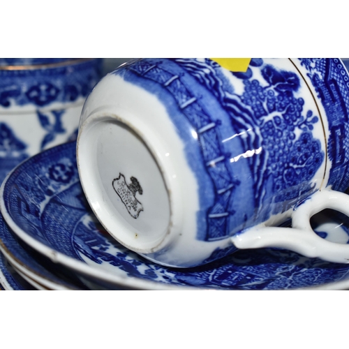 555 - A GROUP OF BLUE AND WHITE WILLOW PATTERN TABLEWARE AND SIMILAR, comprising a C.W.S Windsor China par... 