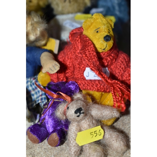 556 - A GROUP OF SMALL SOFT TOYS AND BEARS, comprising a Norah Wellings style souvenir sailor doll, height... 