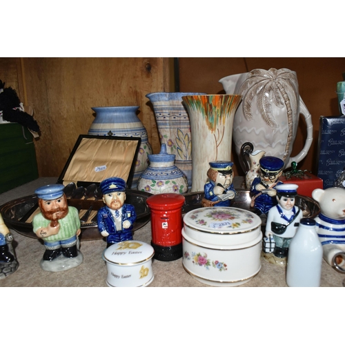 565 - A QUANTITY OF CERAMICS AND ORNAMENTS, comprising two Circle Pottery Art Deco design jugs(crazed) and... 