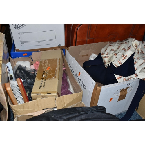 575 - SEVEN BOXES AND LOOSE CLOTHING, TABLE LINEN AND TWO  VINTAGE FAUX LEATHER SUITCASES, to include a pa... 