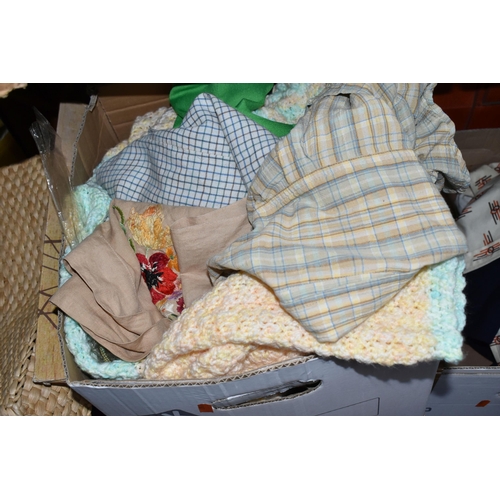 575 - SEVEN BOXES AND LOOSE CLOTHING, TABLE LINEN AND TWO  VINTAGE FAUX LEATHER SUITCASES, to include a pa... 