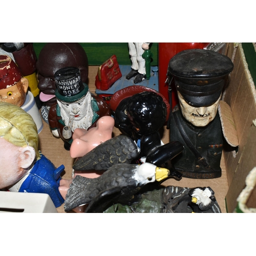579 - A BOX OF NOVELTY MONEY BOXES, to include cast iron examples of different ages, including boxes in th... 