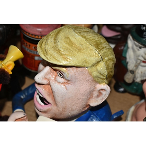 579 - A BOX OF NOVELTY MONEY BOXES, to include cast iron examples of different ages, including boxes in th... 