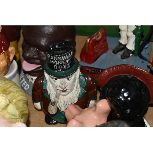 579 - A BOX OF NOVELTY MONEY BOXES, to include cast iron examples of different ages, including boxes in th... 
