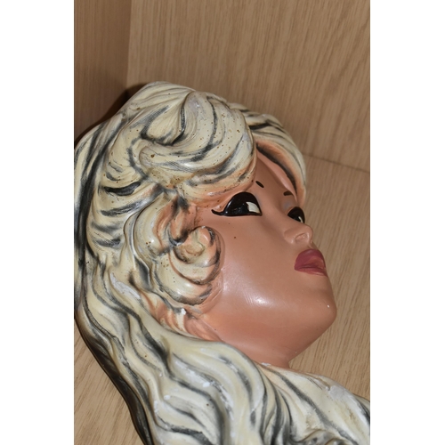 333 - A BRIDGITTE BARDOT CHALKWARE WALL PLAQUE, height 32cm x width 13cm, a 1960's Bridgitte Bardot with t... 