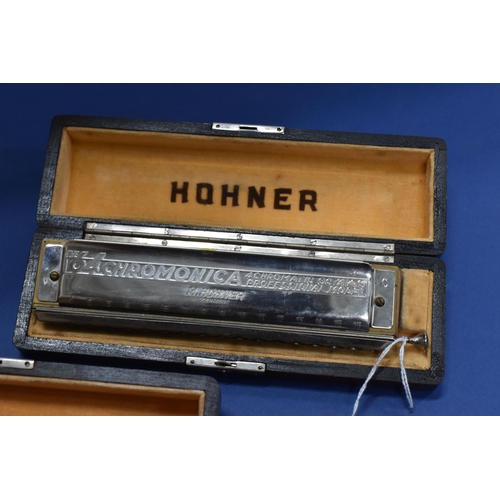 425 - TWO CASED HOHNER 64 CHROMONICA HARMONICAS, both appear complete and in good condition, in original f... 