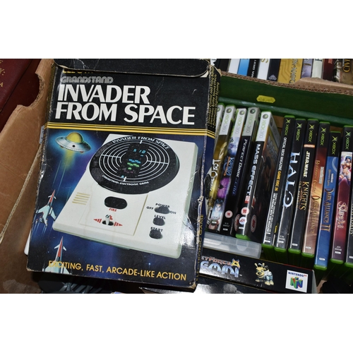 573 - A BOX OF NINTENDO AND XBOX VIDEO GAMES, includes a Grandstand Invaders From Space electronic game, a... 