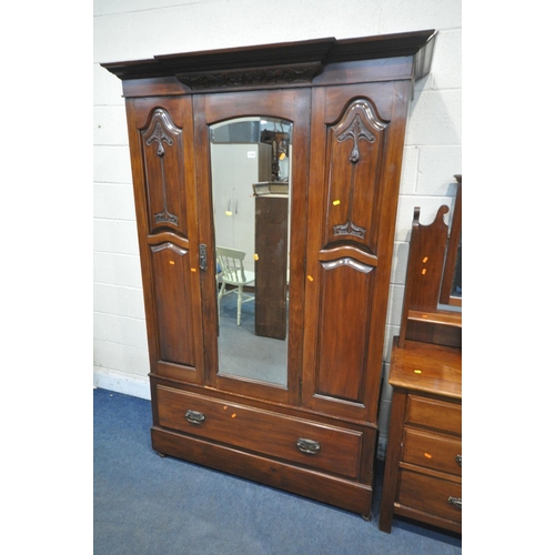 1198 - AN EDWARDIAN MAHOGANY WARDROBE, with a single bevelled mirror door, above a single drawer, width 135... 