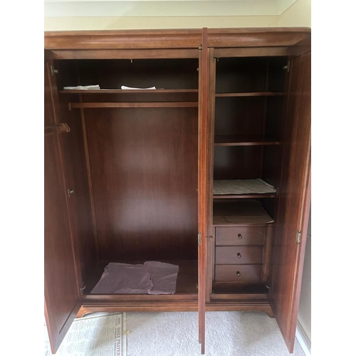 1248 - WILLIS AND GAMBIER, A CHERRYWOOD TRIPLE DOOR WARDROBE, the right hand door enclosing three shelves, ... 