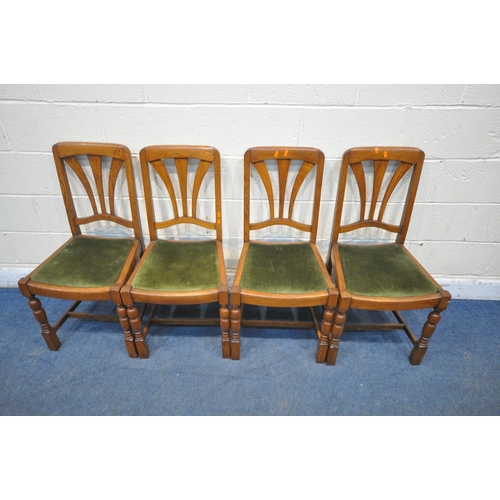 1355 - A SET OF FOUR EARLY 20TH CENTURY OAK CHAIRS, with green upholstered drop in seat pads (condition rep... 