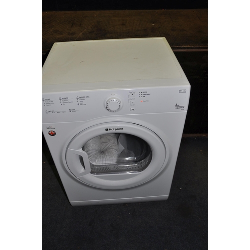 1085 - A HOTPOINT TVFS63 TUMBLE DRYER with outlet pipe width 60cm depth 50cm height 85cm (PAT pass and work... 