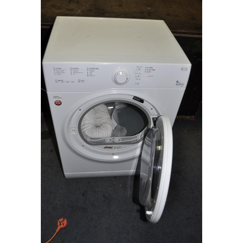 1085 - A HOTPOINT TVFS63 TUMBLE DRYER with outlet pipe width 60cm depth 50cm height 85cm (PAT pass and work... 