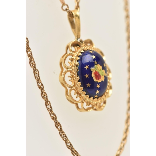 13 - AN 18CT GOLD ENAMEL PENDANT AND CHAIN, the oval pendant with central blue enamel dome with star and ... 