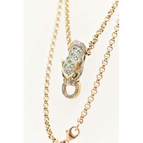 20 - A 9CT GOLD PANTHER HEAD PENDANT NECKLACE, the panther head set with circular cut emeralds and single... 