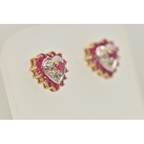 21 - A 9CT GOLD RUBY AND DIAMOND HEART PENDANT NECKLACE AND MATCHING EARRINGS, the pendant of an open wor... 