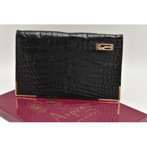 26 - AN 'ASPREY LONDON' 9CT GOLD MOUNTED CROCODILE SKIN WALLET, of a rectangular form, displaying the ini... 