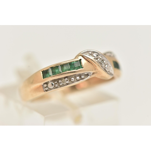 29 - A 9CT GOLD EMERALD AND DIAMOND RING, of interlocking design set with three single cut diamonds and a... 