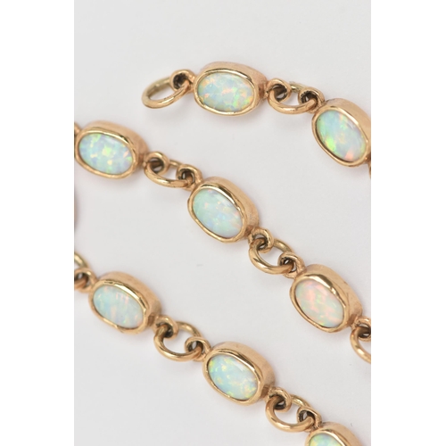 31 - A 9CT GOLD OPAL BRACELET, each link designed as an oval opal cabochon in a collet setting, to the sp... 