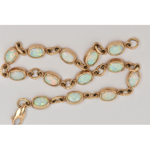 31 - A 9CT GOLD OPAL BRACELET, each link designed as an oval opal cabochon in a collet setting, to the sp... 