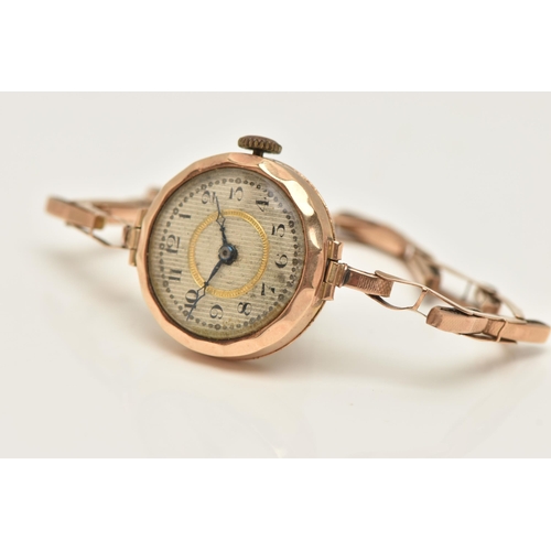 46 - AN EARLY 20TH CENTURY 9CT GOLD WRISTWATCH, hand wound movement, round dial, Arabic numerals, yellow ... 