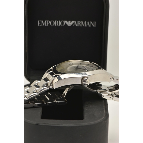 48 - AN EMPORIO ARMANI GENTLEMAN'S WATCH, the circular brushed silver face with black Roman numerals and ... 