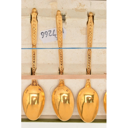 57 - A CASED SET OF EIGHT 'CHRISTOFLE' FRENCH GILT TEASPOONS, each with acanthus bud detail to terminal, ... 