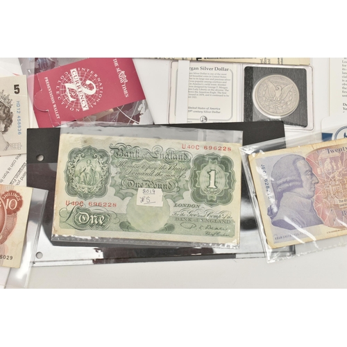 112 - A CARDBOARD BOX CONTAINING COINS AND BANKNOTES, to include a selection of Franklin Mint USA carded c... 