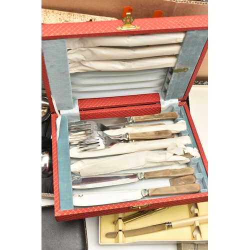 82 - A BOX OF ASSORTED WHITE METAL WARE, to include a pair of silver candle sticks on round weighted base... 