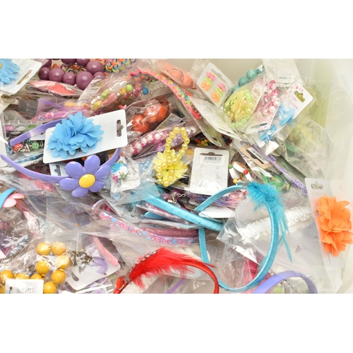 90 - A LARGE BOX OF ASSORTED CHILDRENS COSTUME JEWELLERY, to include necklaces, hair clips, bobbles headb... 