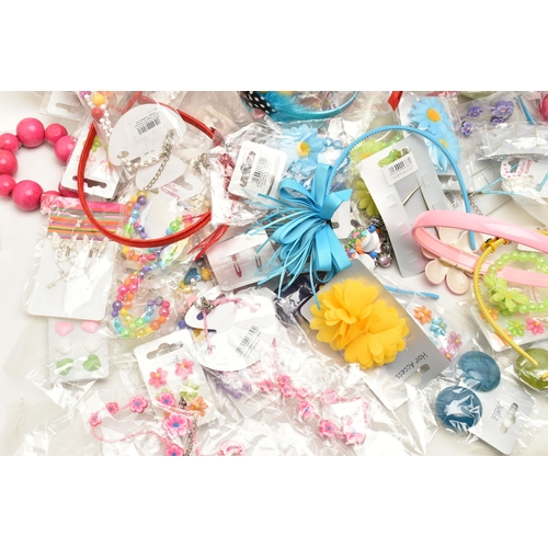 90 - A LARGE BOX OF ASSORTED CHILDRENS COSTUME JEWELLERY, to include necklaces, hair clips, bobbles headb... 