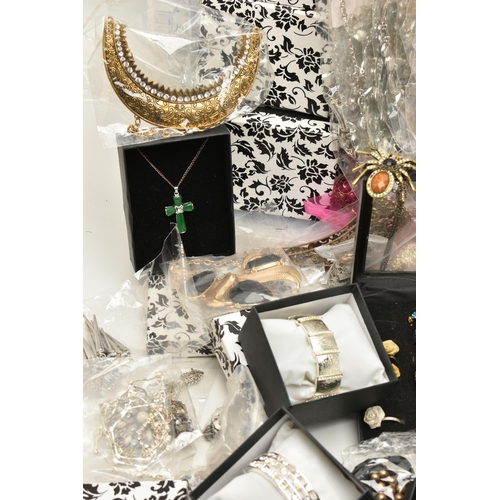 93 - A LARGE BOX OF ASSORTED COSTUME JEWELLERY, to include rings, earrings, bracelets, necklaces and chai... 