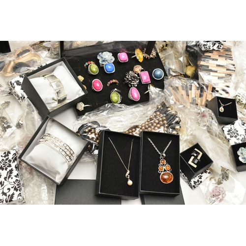 93 - A LARGE BOX OF ASSORTED COSTUME JEWELLERY, to include rings, earrings, bracelets, necklaces and chai... 