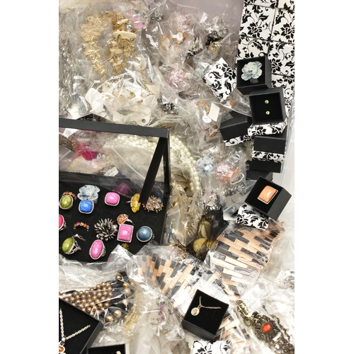 93 - A LARGE BOX OF ASSORTED COSTUME JEWELLERY, to include rings, earrings, bracelets, necklaces and chai... 