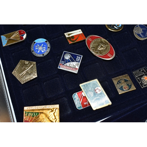 253 - AN ALUMINIUM FLIGHT CASE CONTAINING RUSSIAN / SOVIET SPACE RELATED PIN BADGES, to include anniversar... 