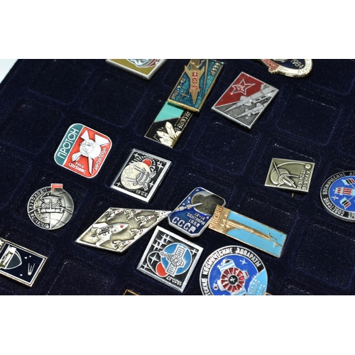 253 - AN ALUMINIUM FLIGHT CASE CONTAINING RUSSIAN / SOVIET SPACE RELATED PIN BADGES, to include anniversar... 